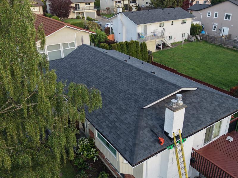 Completed charcoal asphalt shingle roof