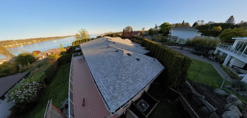 Waterfront home with a new shingle roof